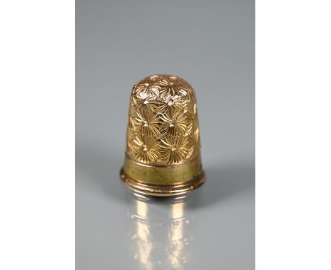 A Victorian 15ct yellow gold thimble with chased decoration, 4.3g