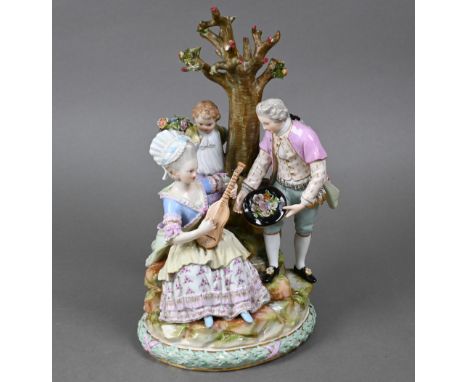 A 19th century Meissen group of a lady with lute, her swain with hatful of flowers and a boy holding a crown of flowers over 