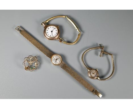 Three ladies 9ct gold wristwatches - Zenith, with integral gold bracelet approx. 20g all-in; Majex  and a 9ct gold brooch (4)