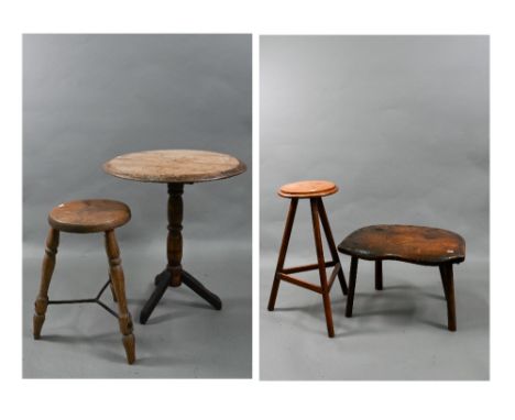 Two antique country tripod stools, with slender cross stretchers, to/with a stick back chair base as a stool and a tripod tab