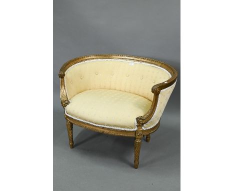 A vintage French gesso framed button back ochre silk upholstered salon chair, raised on turned spiral moulded legs, 85 cm w x