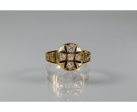 A Victorian 18ct yellow gold mourning ring with black enamelled detailing and central cross set with five old cut diamonds, C