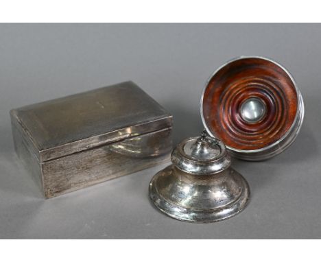 An engine-turned silver cigarette box with cedar lining, Harman Bros, Birmingham 1962, to/w a bottle coaster with turned wood