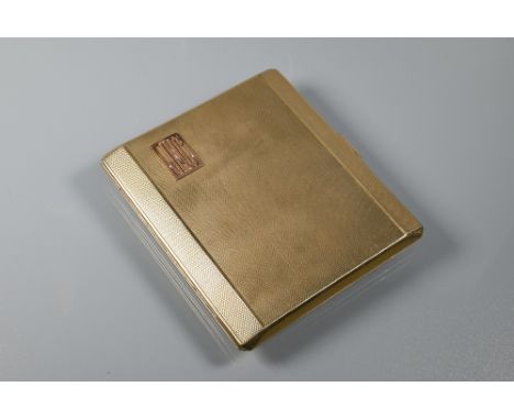 A 9ct yellow gold cigarette case with engine turned decoration, applied monogram JMC and engraved within 'Joany from Peter', 