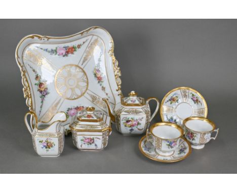 An early 20th century Continental porcelain Cabaret tea service with floral painted decoration and gilding, comprising a teap