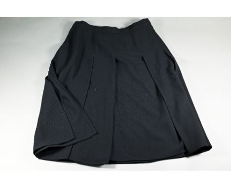 Chanel Boutique - a vintage black 'Flying Panels' wool skirt, size 38 but 8/10