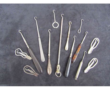 A selection of button hooks,, incl. a promotional "Shepherd's Bush Empire Theatre" example and various folding hooks (a/f) 