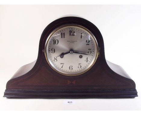 An early 20th century mantel clock by Bravingtons with striking movement