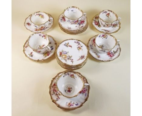 A Hammersley floral painted part tea service comprising six cups, nine saucers and eight tea plates