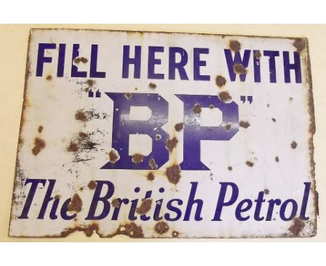 A vintage enamel double sided petrol advertising sign for BP - British Petroleum - 68cm long x 48cm wide