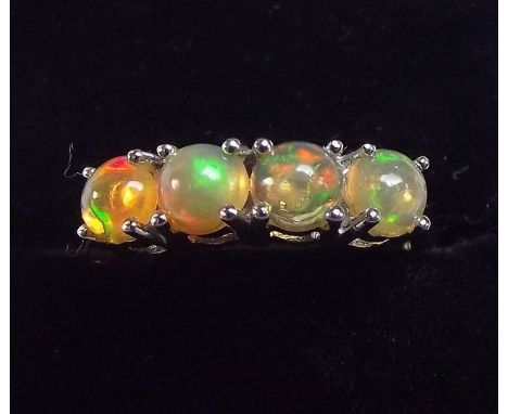 A silver ring set Ethiopian opal - size P