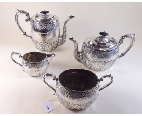 A four piece silver plated tea service with embossed decoration