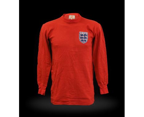 red long sleeved England no.7, with Umbro label and Three Lions crest to front, 'Sportswear UMBRO Choice of Champions' stampe