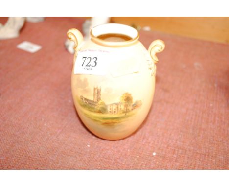 A Royal Worcester baluster vase with scenic decorated panel of Cirencester Church and Abbey