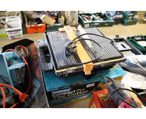 A Plasplugs compact plus tile cutter with original box