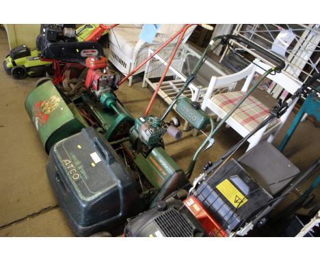An Atco Commodoore B17 petrol cylinder mower with rear roller
