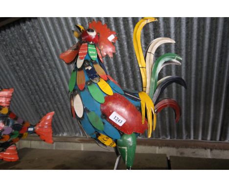 A recycled tin model of a rooster (130)