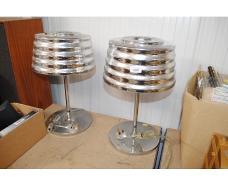 A pair of metal Art Deco style table lamps