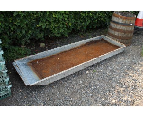 A long metal trough approx. 84" x 26"