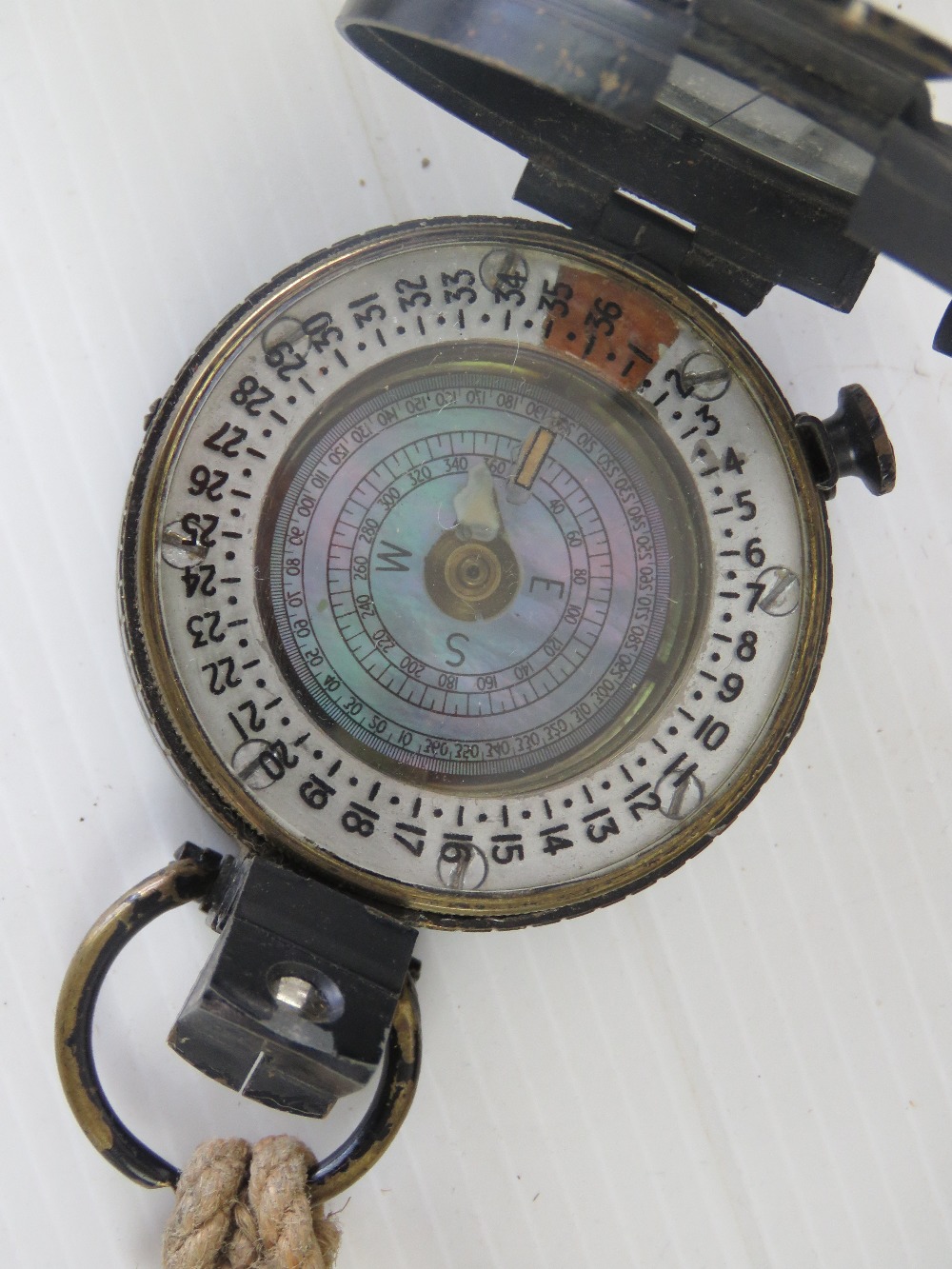 A WWII British MKIII compass by T.G.Co Ltd, numbered 201403, marked