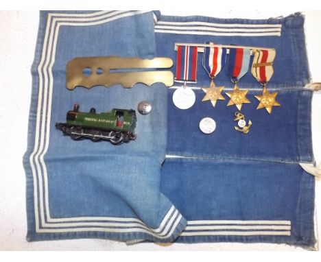 WWII medals:- War medal, 1939-45 star, France and Germany Star and Africa Star, (North Africa Clasp), together with a button 