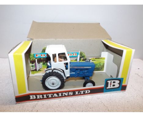 Britains:- 9527 Ford 5000 tractor in box (no cellophane) box with plain card outer.