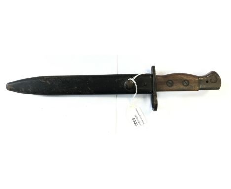 WW2 British Jungle Carbine Bayonet. 20cm long Bowie style blade marked "294 WSC" and "X". Complete with scabbard marked "S 29
