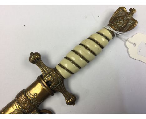 WW2 Third Reich Kriegsmarine Officers Dagger. Plain non etched double fullered 25cm long blade by "WKC". White grip with grip
