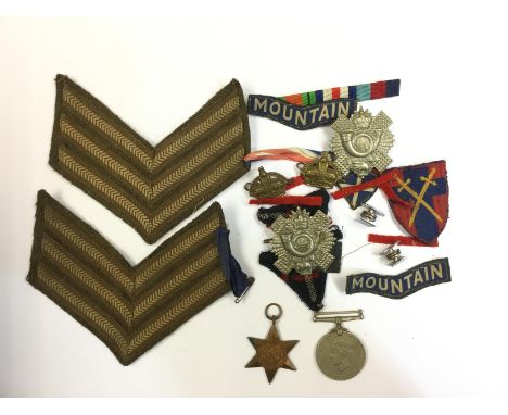 WW2 British 1939-45 Star and War Medal (no ribbons) along with pair of Highland Light Infantry cap badges, ribbon bar, pair o