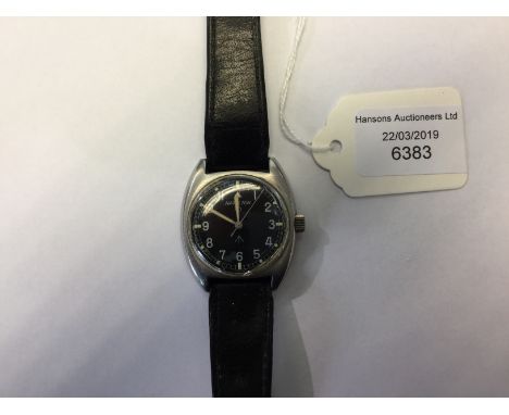 British Army issue wristwatch by Hamilton. Model W10. Black dial with Arabic numerals and Broad Arrow. Reverse marked "523-82