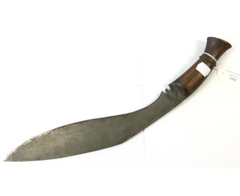 WW2 British Kukri knife. Un painted, plain wooden grip. Steel blade 33cm long, no markings. No scabbard. Overall length 44cm.