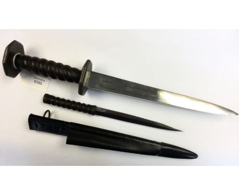 A handmade Scottish inspired style knife with heavy 23cm long single edged bright steel blade. Wooden grip with Barleycorn tw