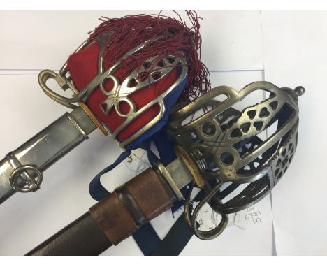 A pair of Scottish Basket Hilt Swords: Scottish Basket hilted Sword with 83cm long double edged unsharpened blade. Blade mark