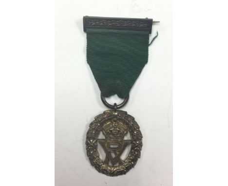 Victorian Volunteer Officers Decoration. VR Monogram. Hallmarked Silver with date letter "R". Complete with ribbon.