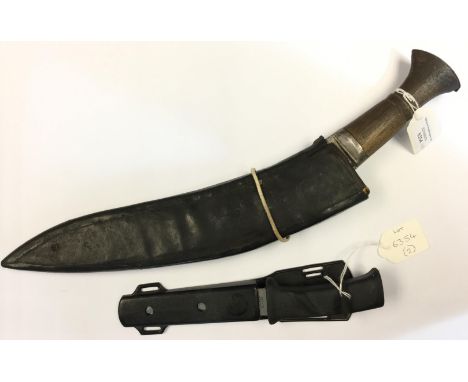 WW2 British Kukri knife. 30cm long unmarked blade. 42cm in overall length. No small knives. Plain wooden grip. Complete with 