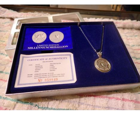 Boxed 999 silver millennium pendant on a sterling silver mount and chain. UK P&amp;P Group 0 (£6+VAT for the first lot and £1