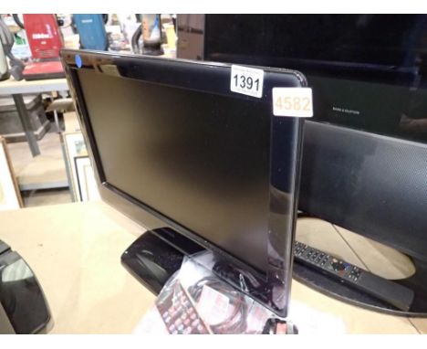 Toshiba LCD TV/DVD 19DV665DB and manual, power cable and remote. All electrical items in this lot have been PAT tested for sa