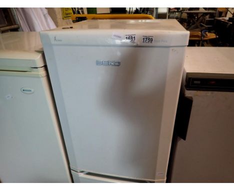 Beko fridge freezer, H:150cm. All electrical items in this lot have been PAT tested for safety and have passed. This does not