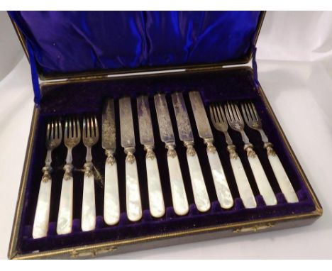 Cased set of fish cutlery with mother of pearl inlaid. Not available for in-house P&amp;P 