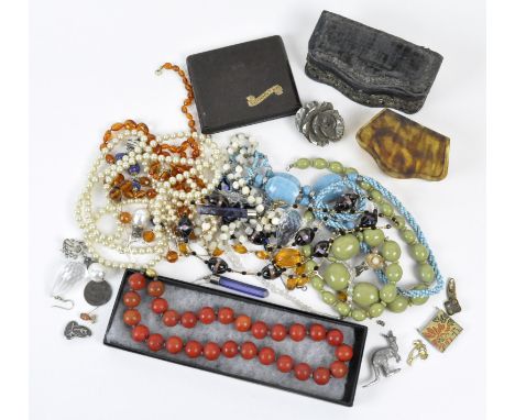 A selection of assorted costume jewellery, including necklaces, bakelite cigarette case, embroidered jewellery box and more