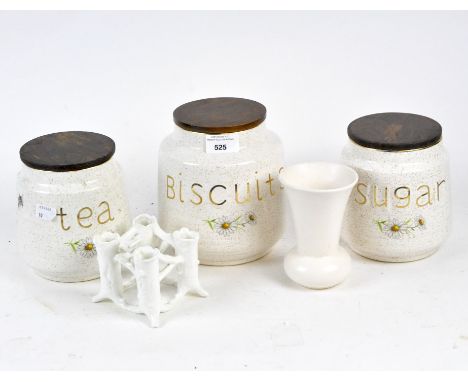 An assortment of ceramic wares, including a Royal Doulton Noke dish, biscuit barrel, table lamp and more