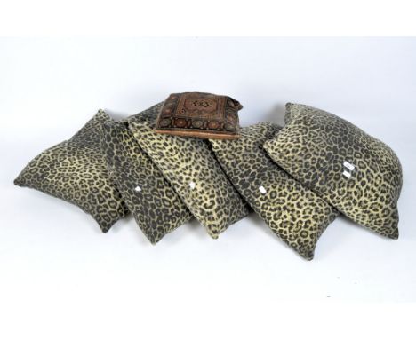 Five contemporary cushions, all with leopard print covers, diameter 57cm