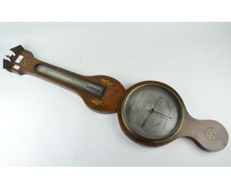 A late 19th/early 20th century barometer, the mahogany case inlaid with star leaf and shell motifs, height 97cm