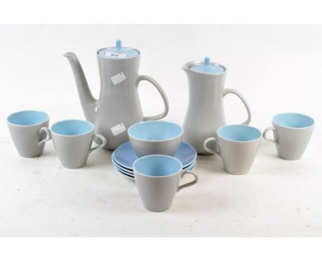 A pale grey and blue Poole part coffee set to include a coffee pot, hot water pot, five cups, sugar bowl and four further pal