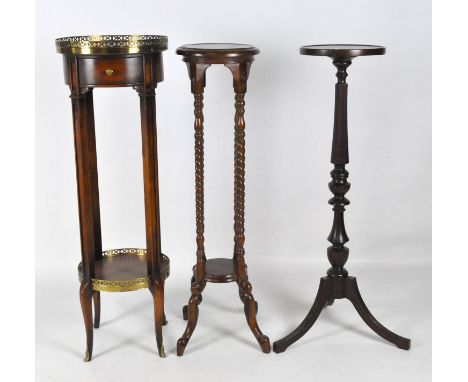 Three 20th century jardiniere stands, all with circular tops, one with barley twist supports and cabriole feet, height 100cm,