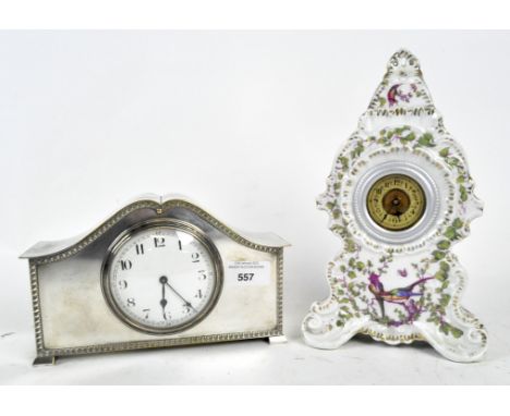 Two 20th century mantle clocks, the first a 1920's clock with a white dial with Arabic numerals within a silver plated case, 