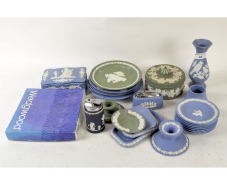 A collection of Wedgwood jasperware, in blue and green, including a lidded pot, cigarette lighter, fluted vase and more