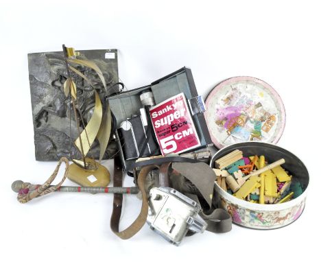 An assortment of wares, including a Sankyo super 5cm cine film camera in original case, a bell punch company London ticket pu