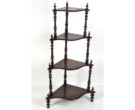 A Victorian mahogany whatnot, the five tiers descending in size and placed on bobbin turned supports, 115cm x 60cm x 37cm
