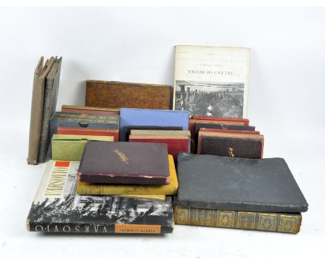 A quantity of vintage books, including works by Samuel Pepys and 'The Pictorial Atlas of the World'